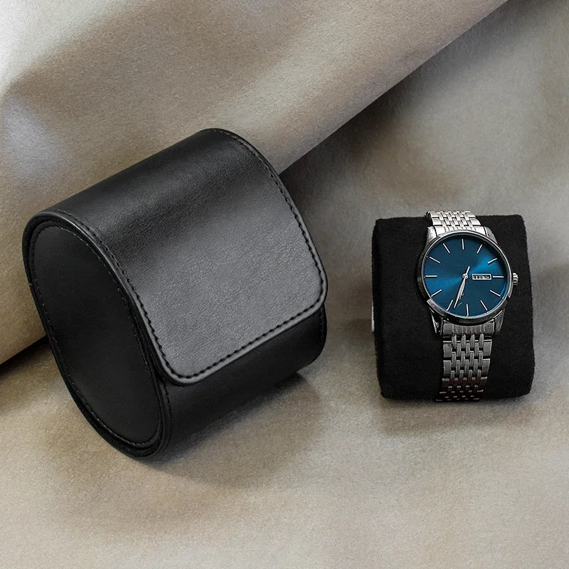 Brown leather watch roll closed with tie strap detail close-up